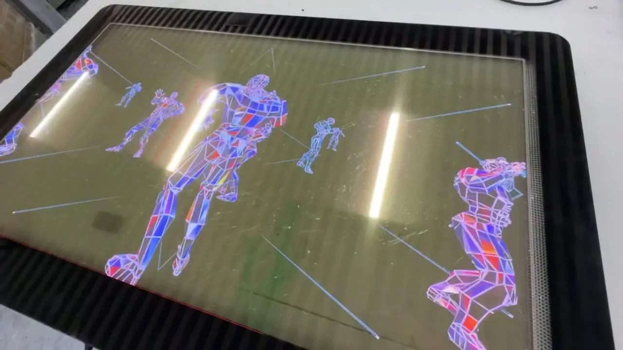 Assembled transparent OLED display running test content during functional system validation